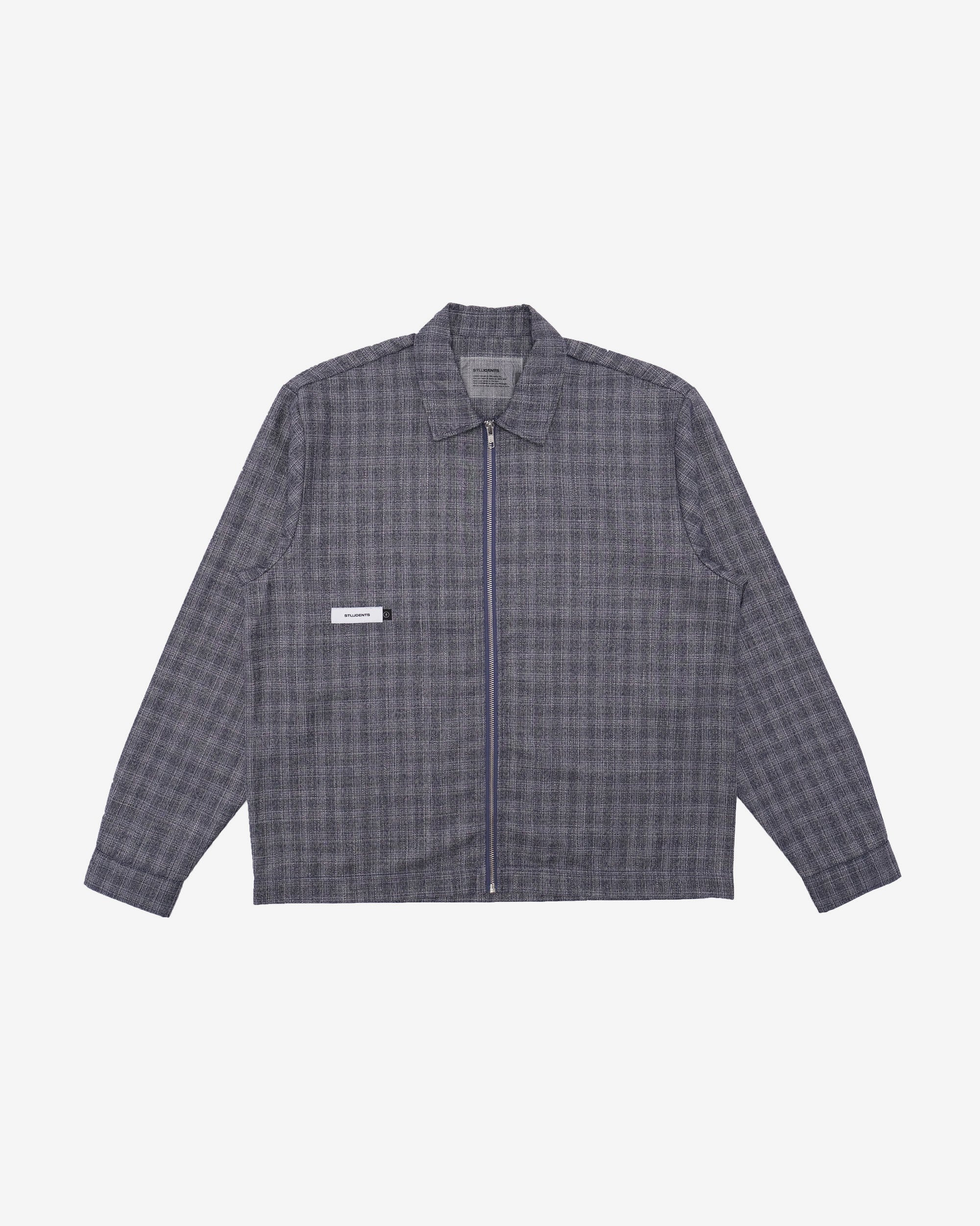 Plaid shirt with a small logo on a white background