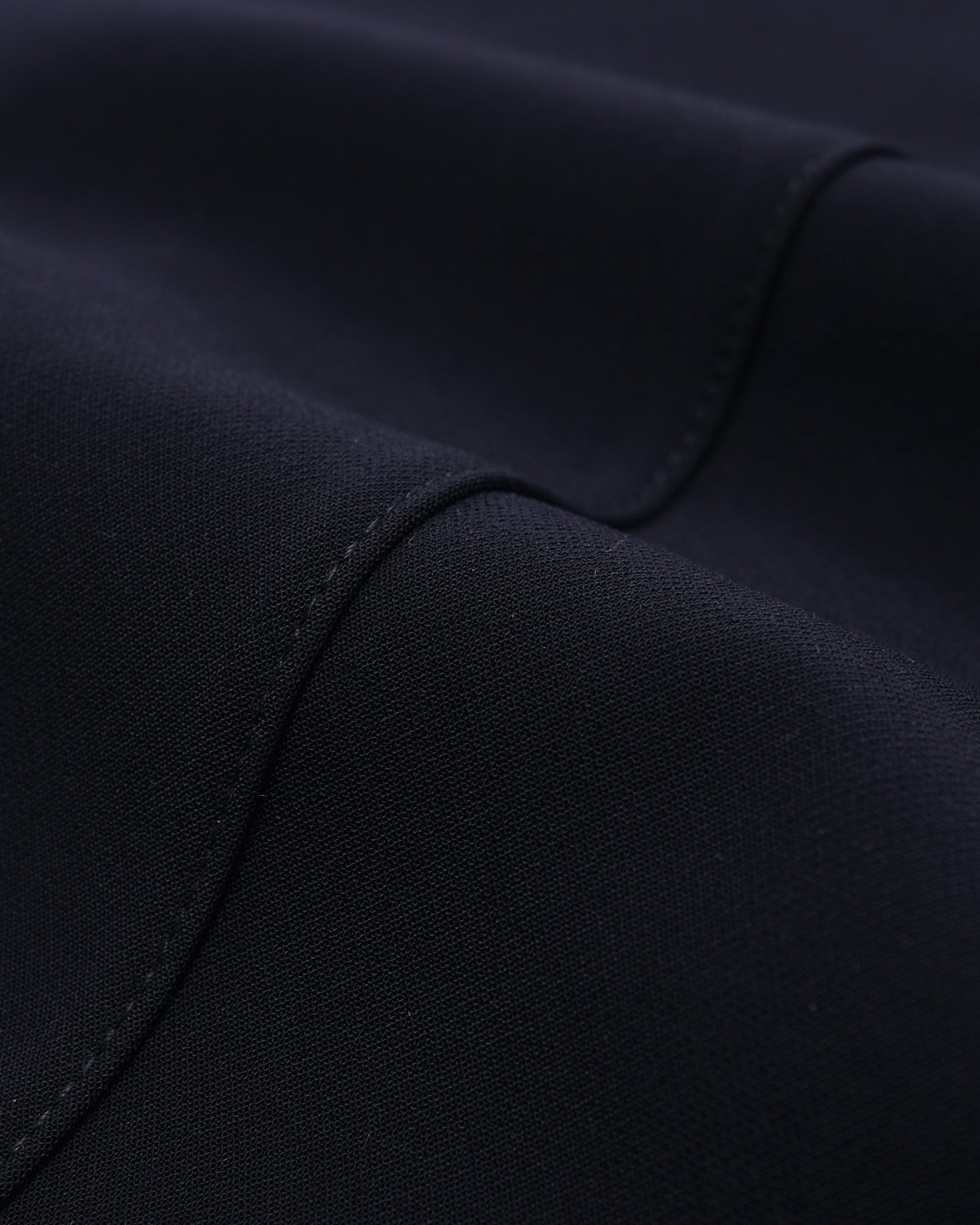 Close-up of a dark blue fabric texture