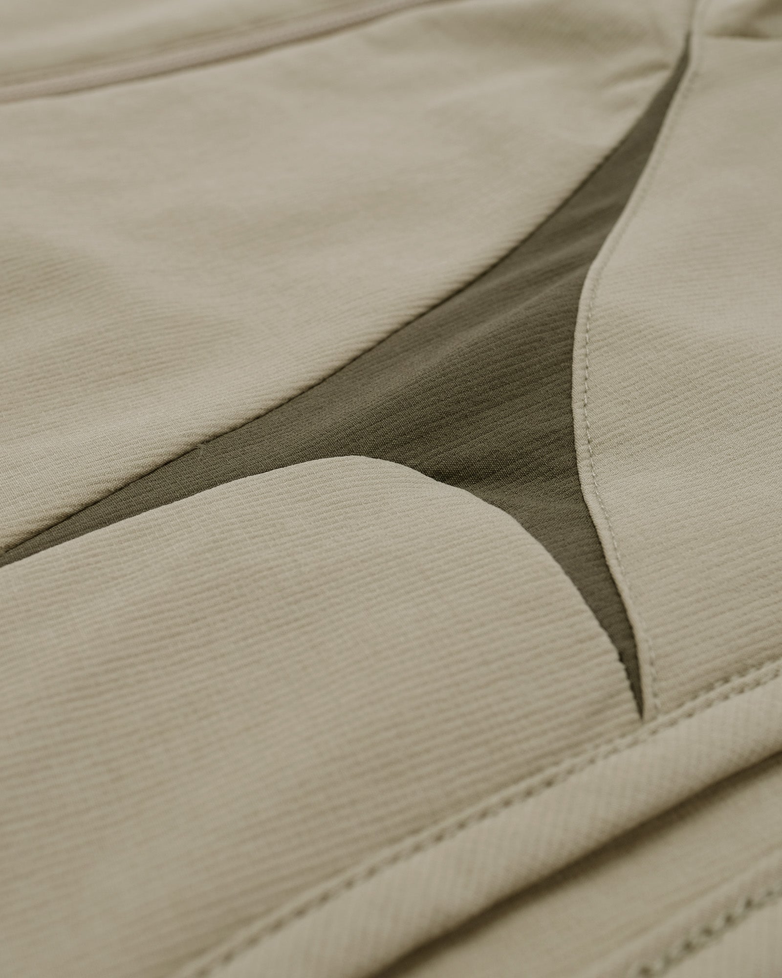 Close-up of beige fabric with a textured pattern