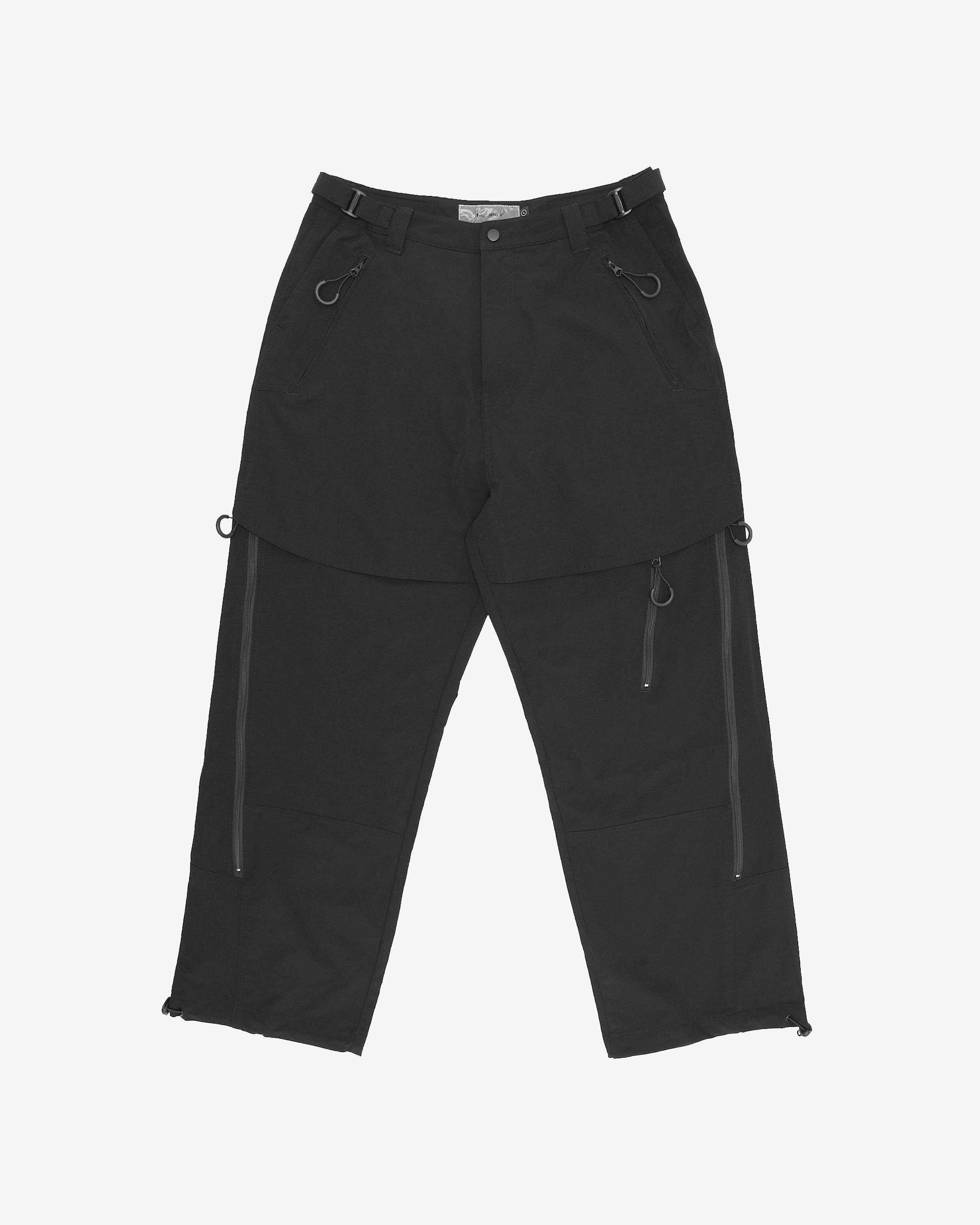 Black pants with multiple zippers and buttons on a white background