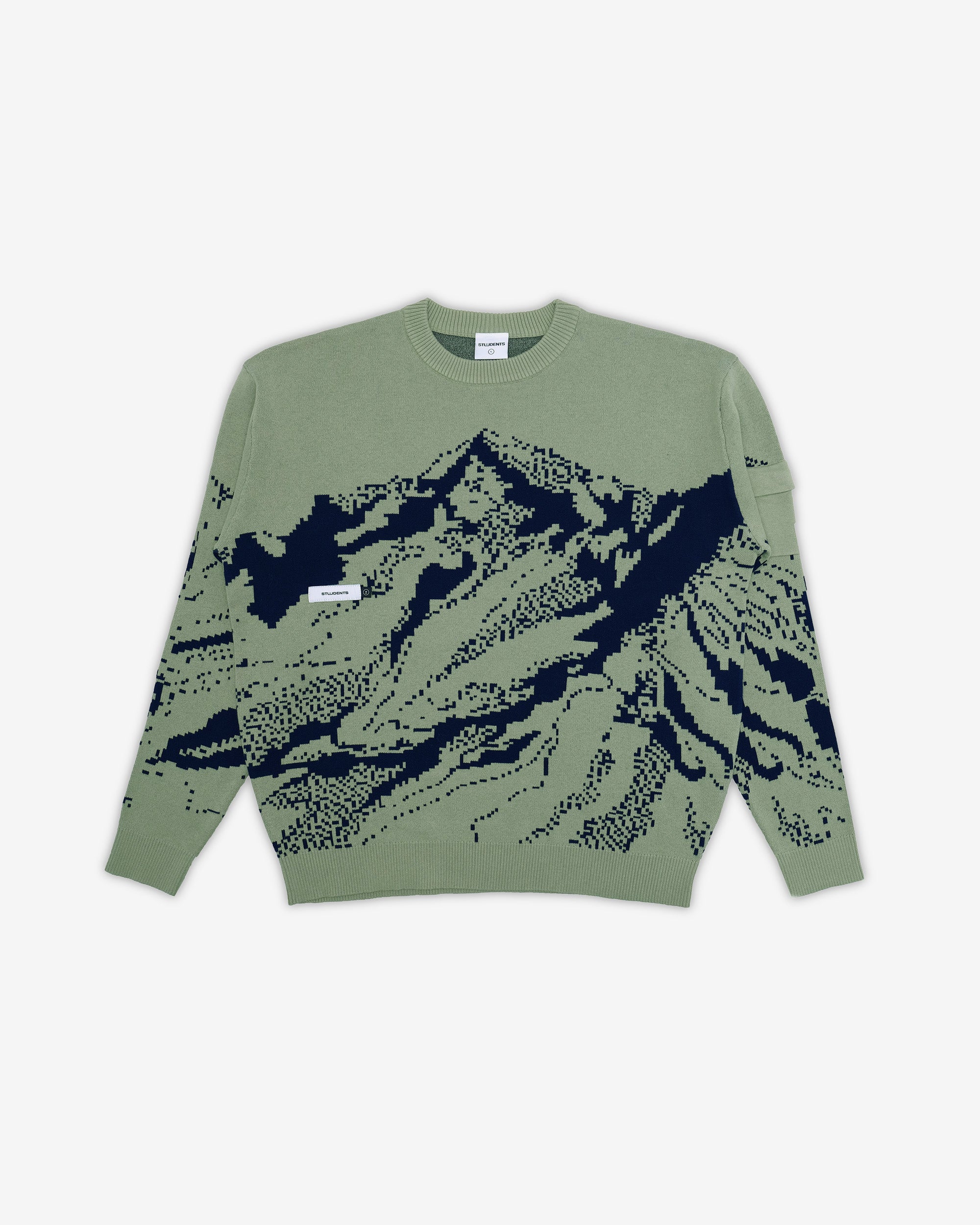 Green sweater with black mountain design on a white background