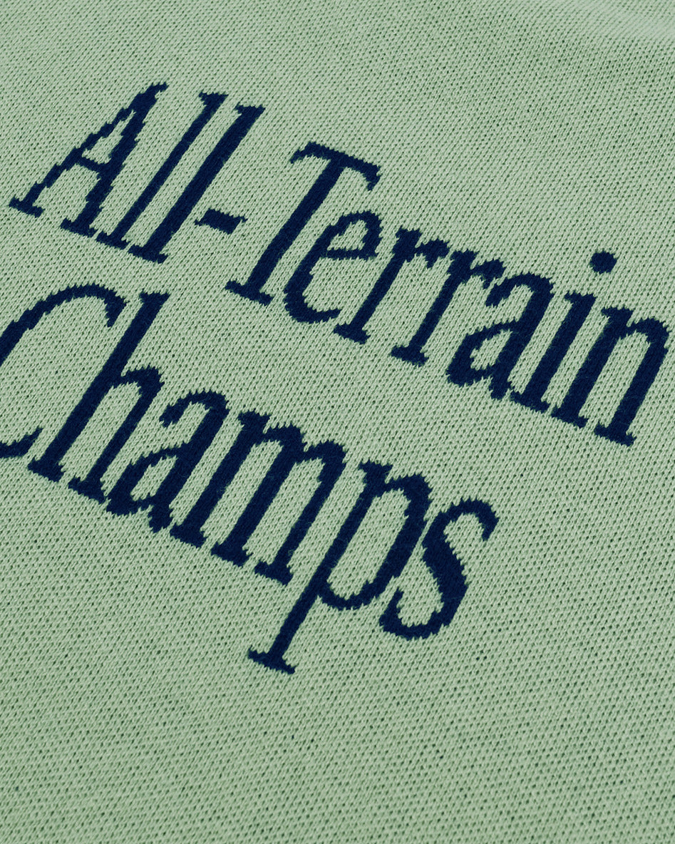 Text 'All-Terrain Champs' on a green background