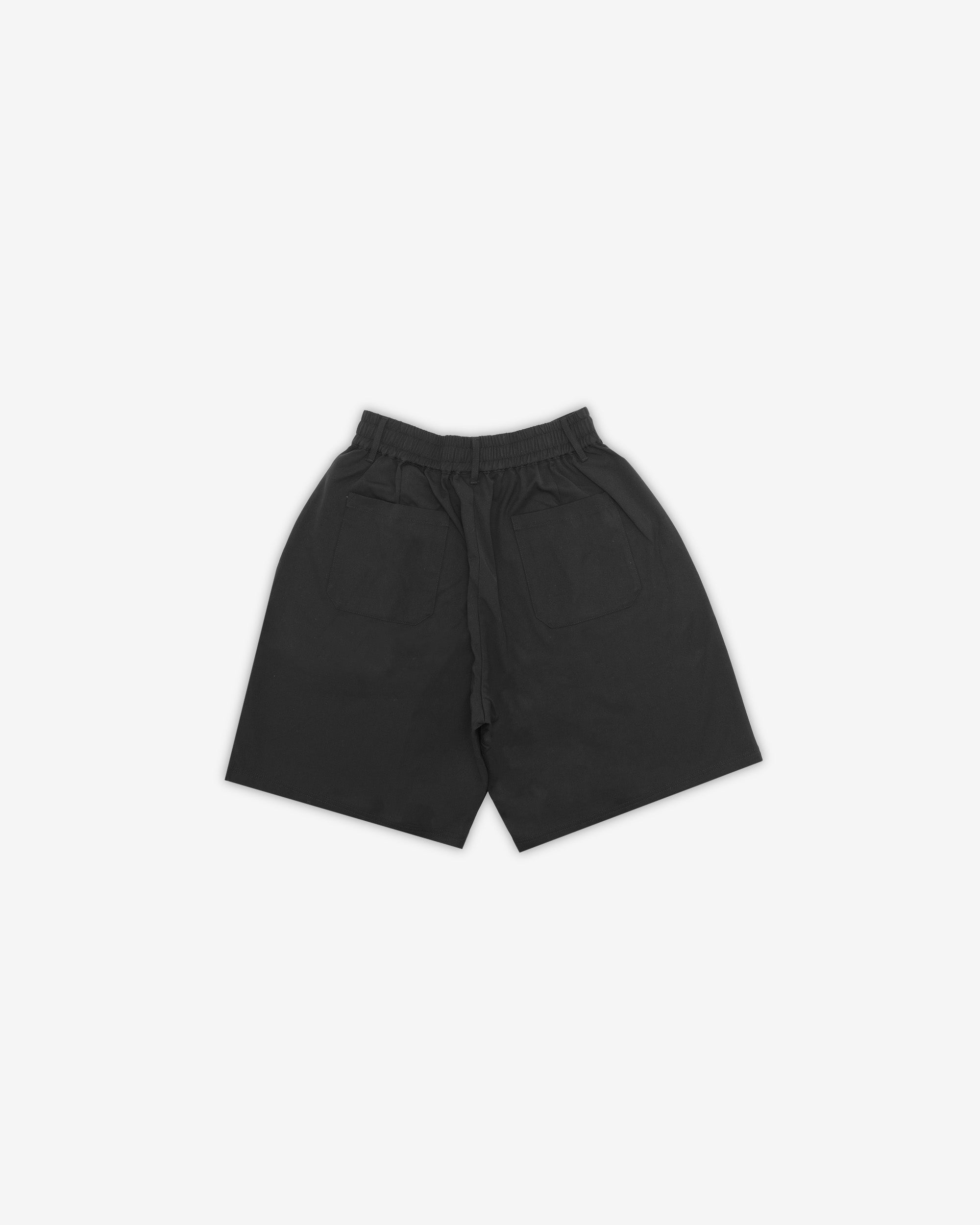 Calculus Baggy Pleated Shorts